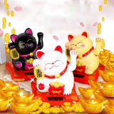 Saludando a Maneki Neko (Gato de la Suerte)